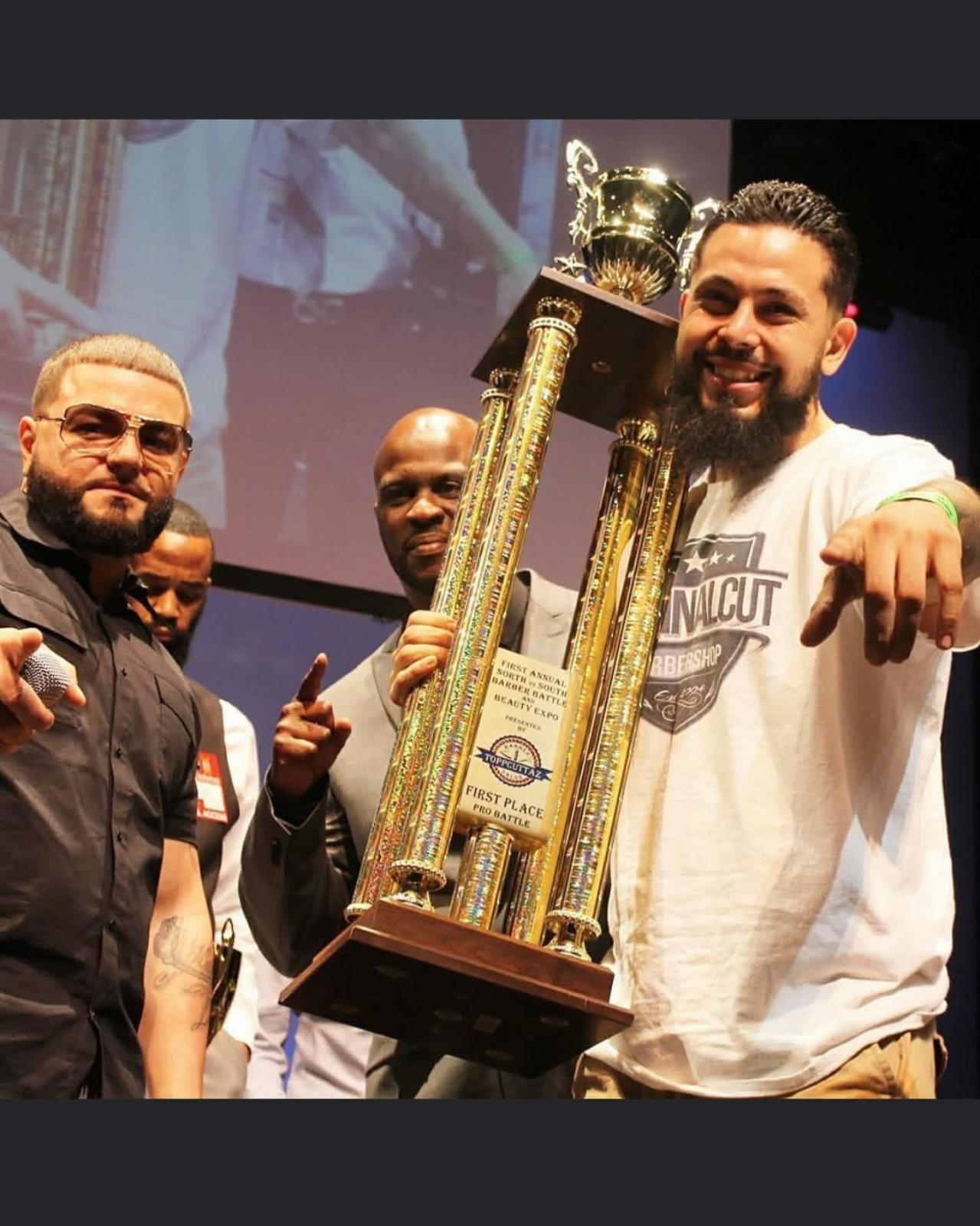 Alexi Soward holding a Trophy